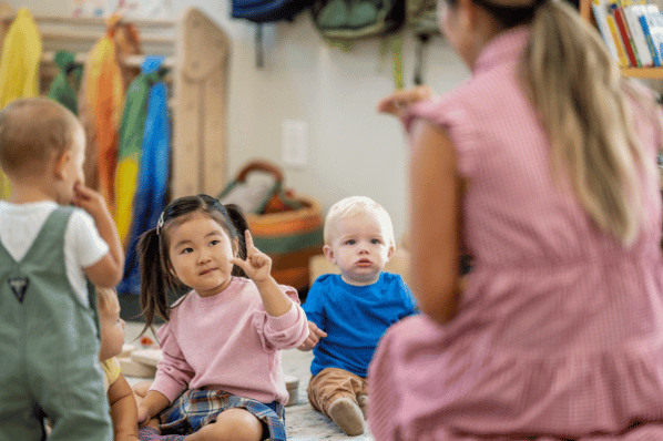 Teacher with children at daycare.