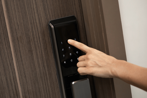 Digital smart code lock mounted on door.